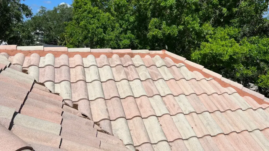 Stone-coated metal roofing panels being set on a St. Petersburg home