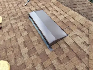 Crew working on flashing during a roof repair job in Plant City