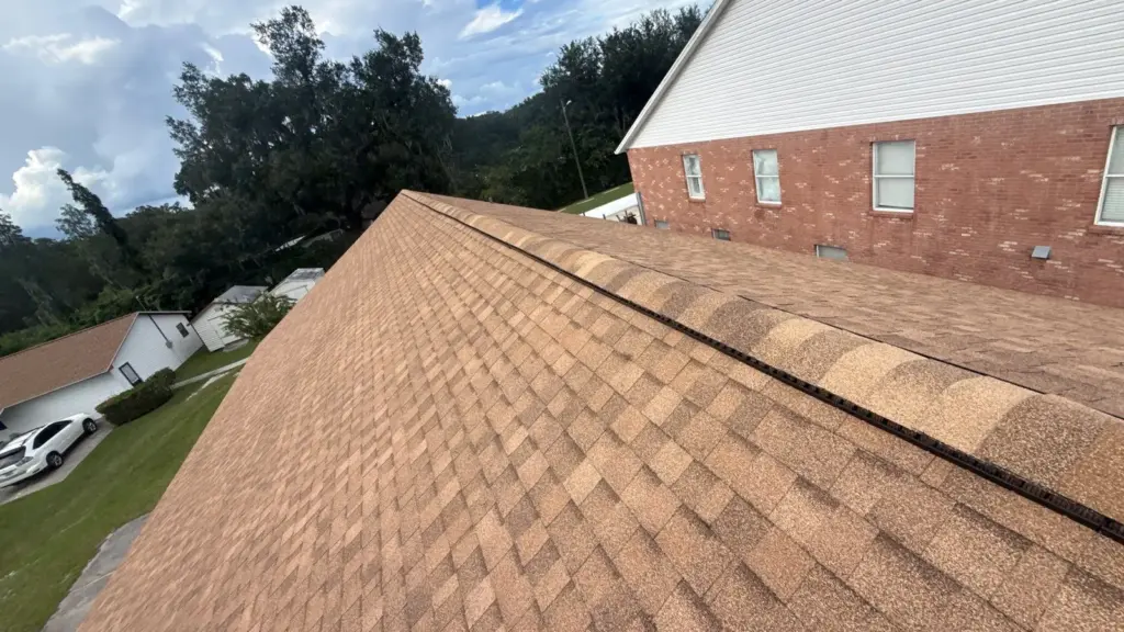 Crew performing roof repair work on a home in Polk County, FL