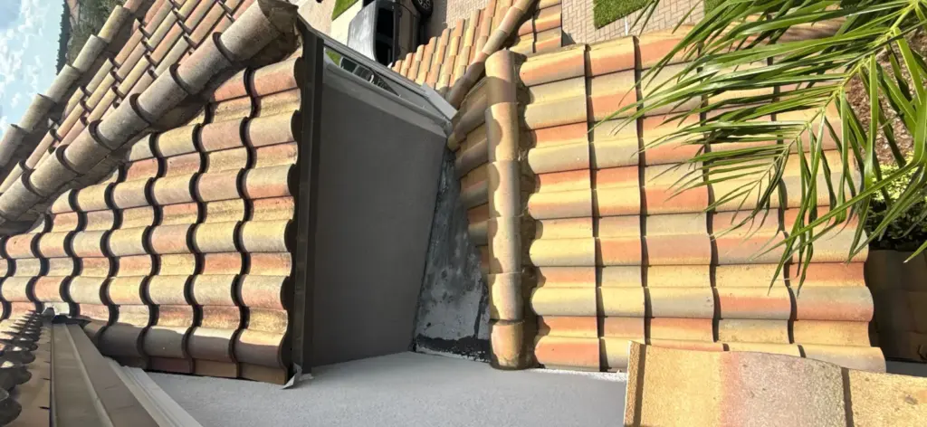 Roof repair work in progress on a Riverview home