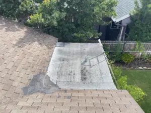 Crew installing new shingles during a roof replacement in Hillsborough County