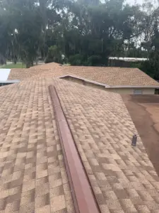 Bare deck exposed mid-project for a residential roof replacement in Polk County