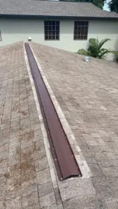 Crew installing new underlayment during roof replacement in Hillsborough County