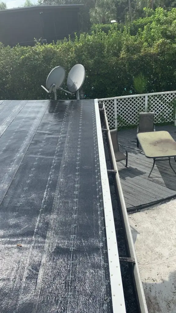 Tear-off in progress during a roof replacement in Hillsborough County