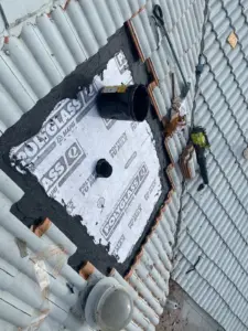 Crew rebuilding a roof section during repair in Pinellas County