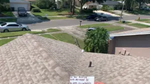 Crew installing underlayment on a roof replacement job in Hillsborough County, FL