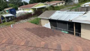 Shingles being laid during a residential roof replacement in Hillsborough County, FL