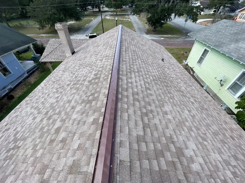 Roof replacement crew working on a home in Polk County, FL
