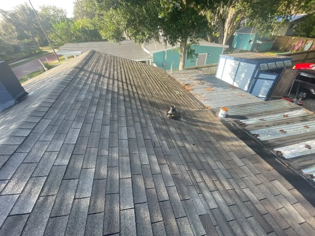 Crew tearing off old roofing during a Clearwater roof replacement