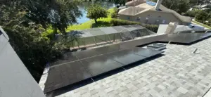 Shingles being laid in sections on a Pinellas County roof replacement