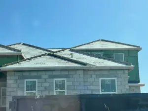 Installing new flashing and sealant on a Riverview roof repair job