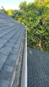 Crew installing flashing and ventilation during Hillsborough County roof replacement