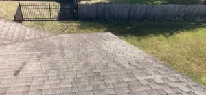 Finished roof replacement on a Valrico property with new flashing and ridge caps