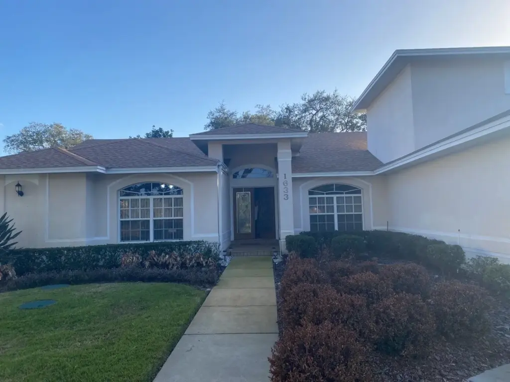 Roof replacement in progress on a Polk County home