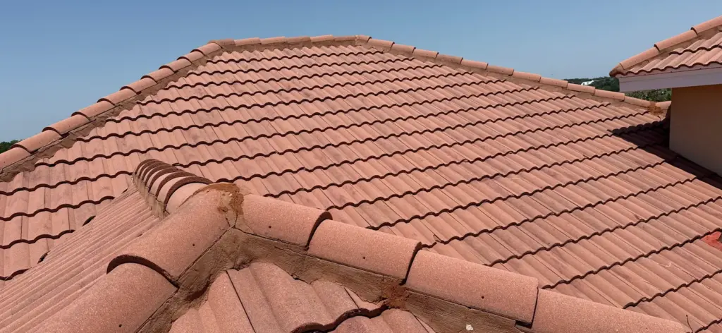 Crew performing roof repair work on a home in Polk County, FL