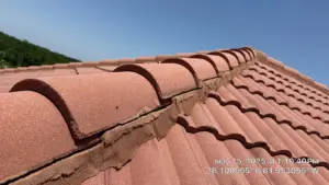 Close-up of finished tile roof ridge line in Polk County