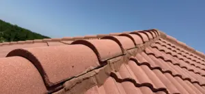 Finished roof repair blending into the rest of the roofline in Polk County
