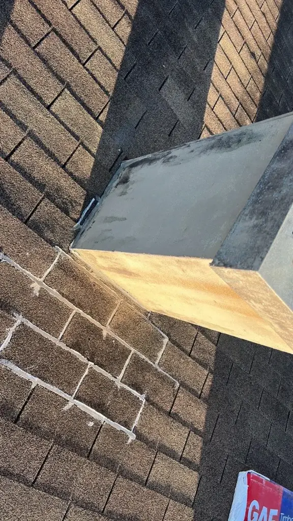 Crew tearing off old roofing during a roof replacement in Polk County