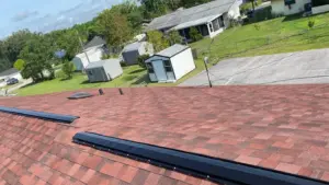 Crew removing old roofing during a Polk County roof replacement