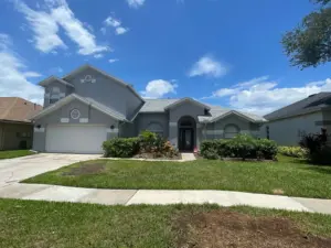 Completed roof replacement project in Hillsborough County with fresh shingles from eave to ridge
