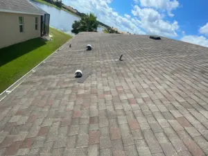 Crew setting new roofing material during a Hillsborough County roof replacement