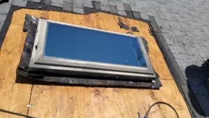 Finished roof repair section in Pinellas County, sealed and restored