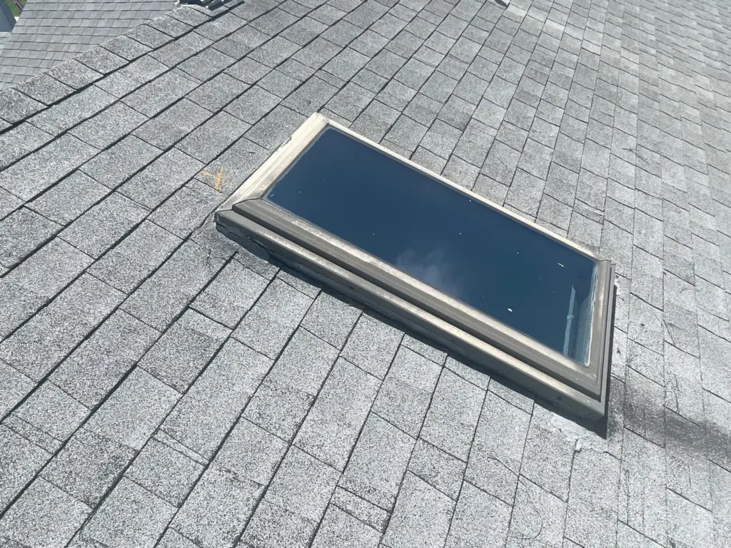 Crew inspecting roof section during repair in Pinellas County