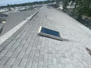 Shingles being reset as part of a roof repair in Pinellas County