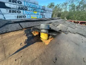 Tear-off stage of a roof replacement job in Polk County