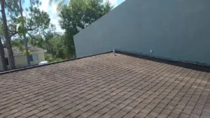 Close-up of shingle and flashing repair during a Clearwater roof repair job