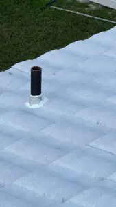 Ridge and flashing detail on a stone-coated metal roof in Pinellas County