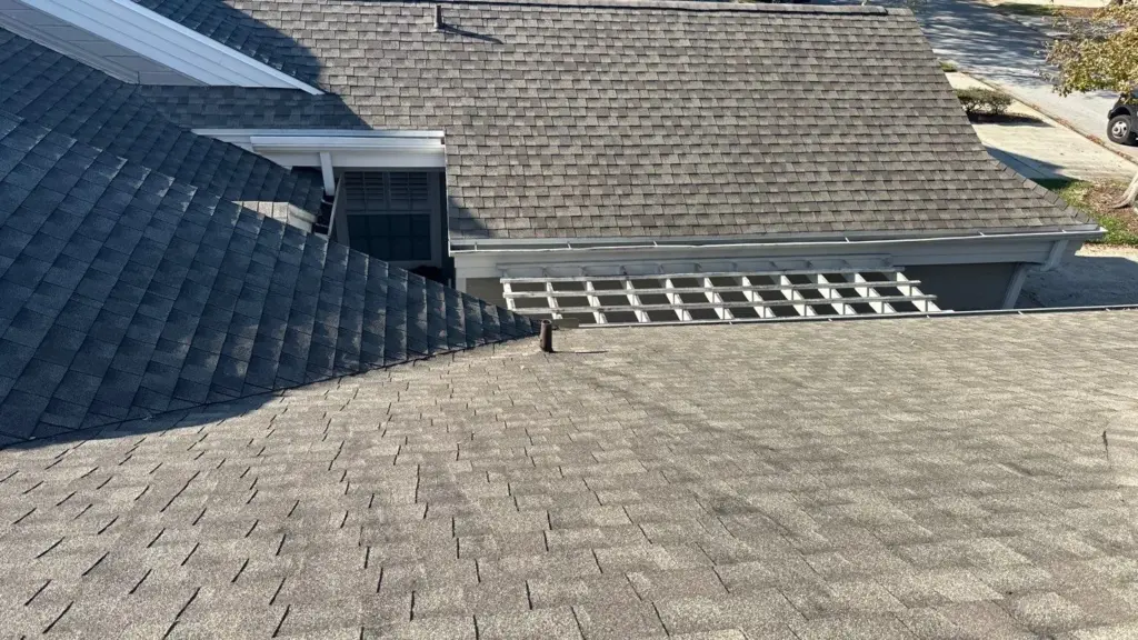 Crew tearing off old roofing during a roof replacement in Polk County, FL