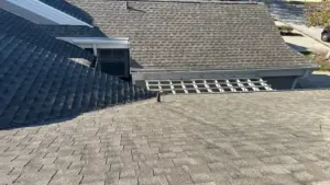Crew inspecting the deck during a Polk County roof replacement
