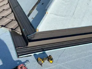 Close-up of stone-coated metal panels and flashing in St. Petersburg