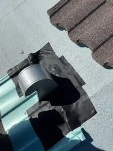 Crew setting stone-coated metal roofing courses in St. Petersburg