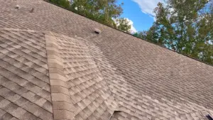 Crew installing new underlayment during roof replacement in Hillsborough County