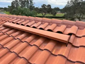 Removing compromised roofing material as part of a repair in Hillsborough County