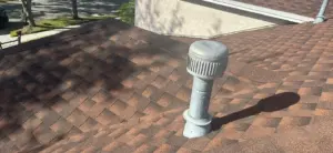 Flashing and ridge detail on completed roof replacement in Hillsborough County