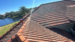 Damaged section being removed during roof repair in Hillsborough County