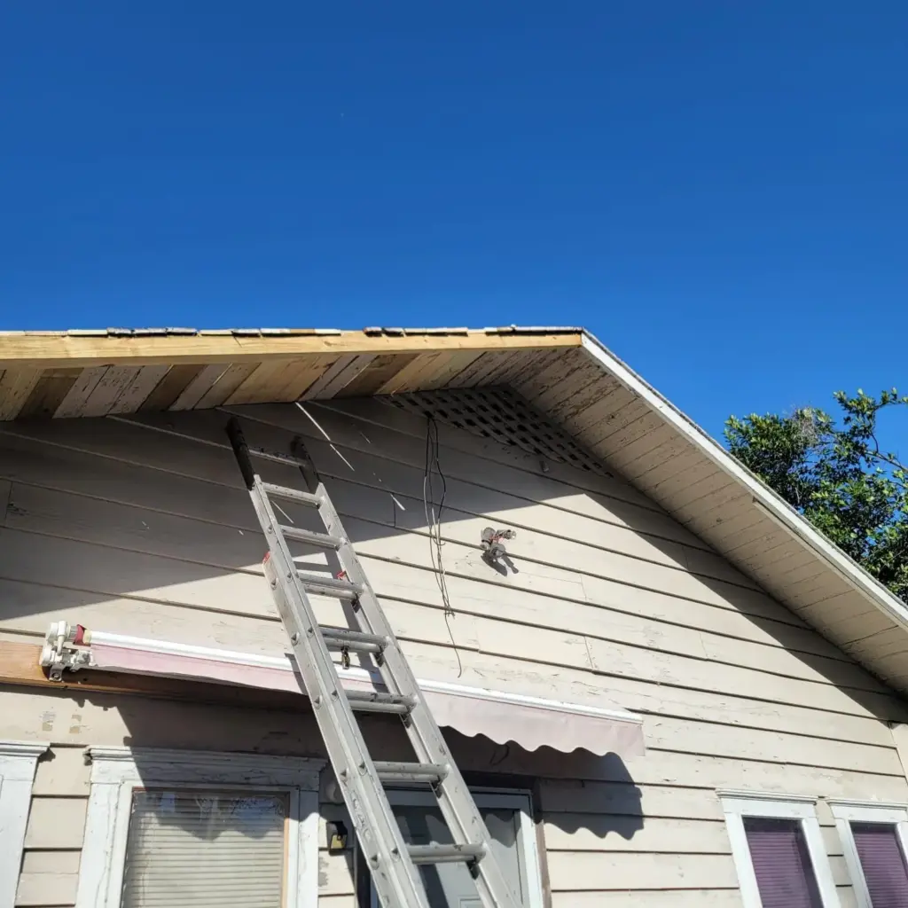 Tear-off underway during a roof replacement in Polk County, FL