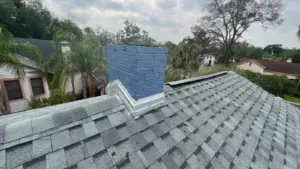 Crew installing underlayment during roof replacement in Hillsborough County