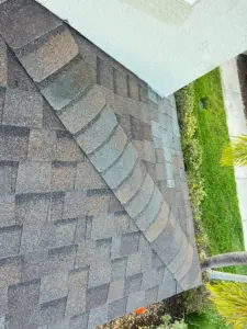 Exposed decking inspected mid-repair on a Tampa Bay area home