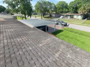 Crew setting new roofing material on a Hillsborough County home