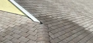 Close-up of roofing material removal during a Riverview roof repair
