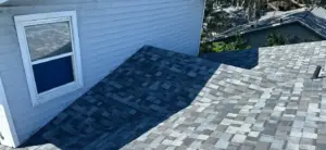 Sealed roof repair section blending into surrounding shingles in Clearwater