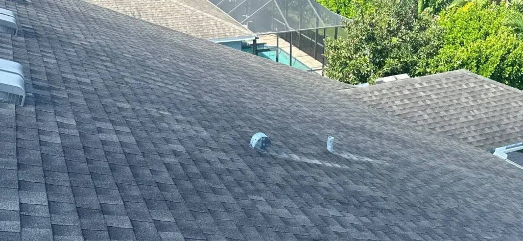 Crew inspecting roof during a roof repair job in Riverview, FL