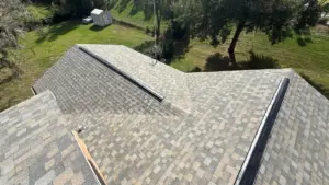 Crew installing new shingles during a Valrico roof replacement