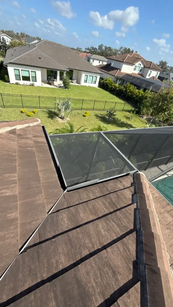 Roofer making a targeted repair on a Valrico home
