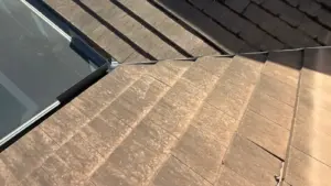 Finished roof repair section blending with surrounding shingles in Valrico