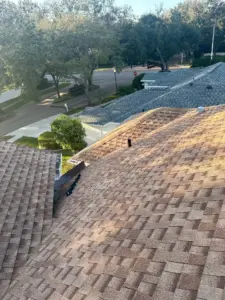 Crew inspecting roofline during repair in Hillsborough County